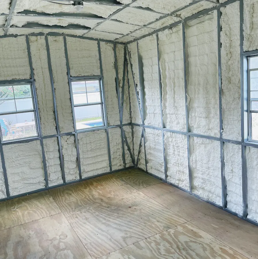 Closed-cell spray foam insulation applied to wall cavities in a residential project in Wasilla